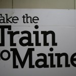 Boston Graphic Design, Amstrak Downeaster sign logo cover train station, Take the Train to Maine
