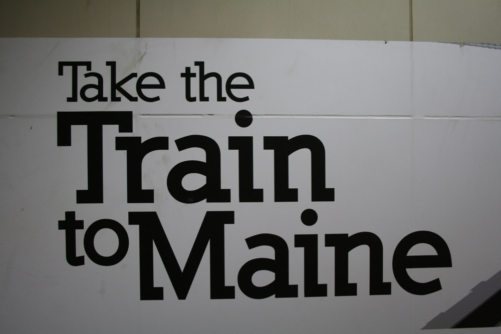 Boston Graphic Design, Amstrak Downeaster sign logo cover train station, Take the Train to Maine
