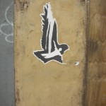 New York Street art (a bird man on glued paper) at Brooklyn (Montrose Av station)